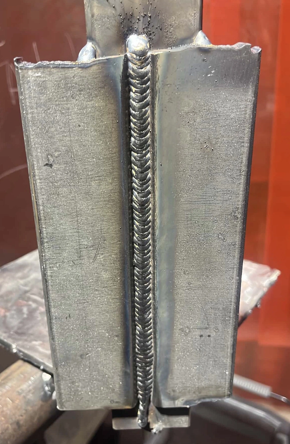 A vertical weld joining two steel plates